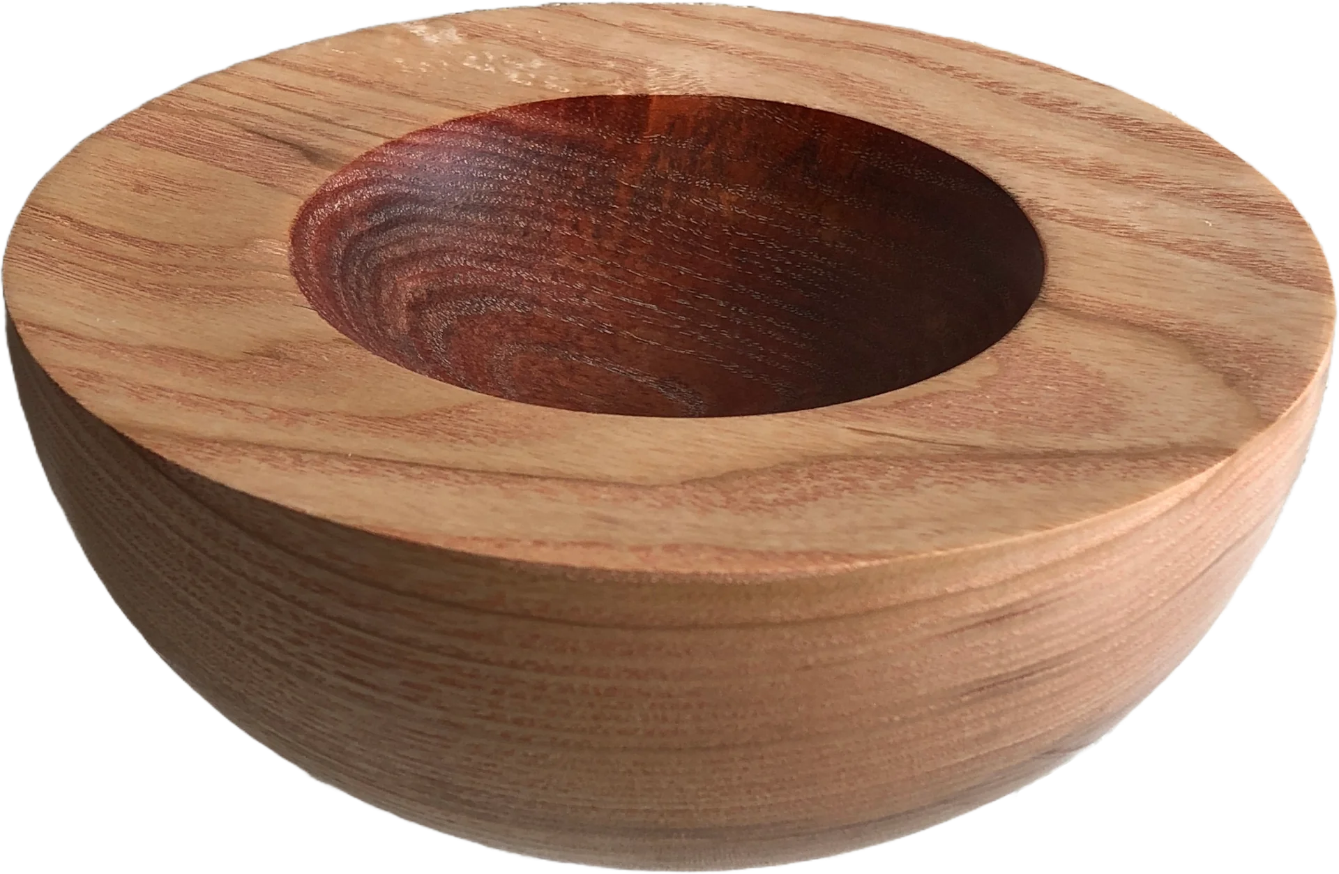 a small light brown bowl with a sunset painted centre