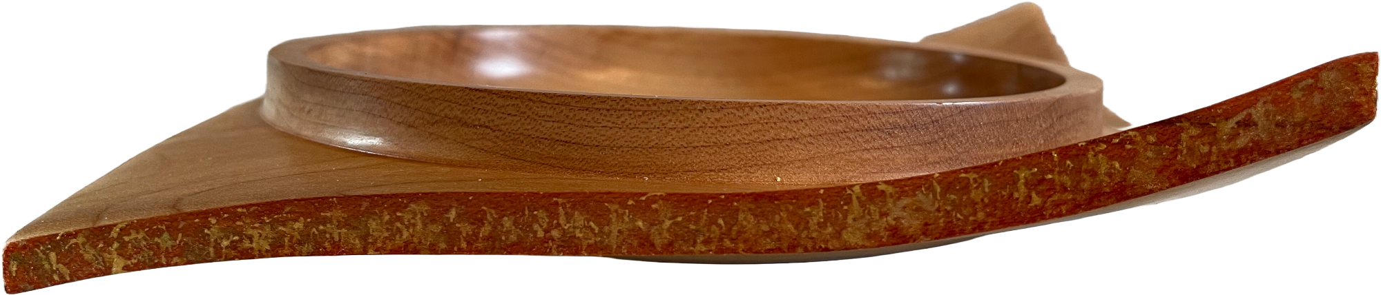 A hand turned bowl with half the corners pointing upwards and the other half pointing downwards