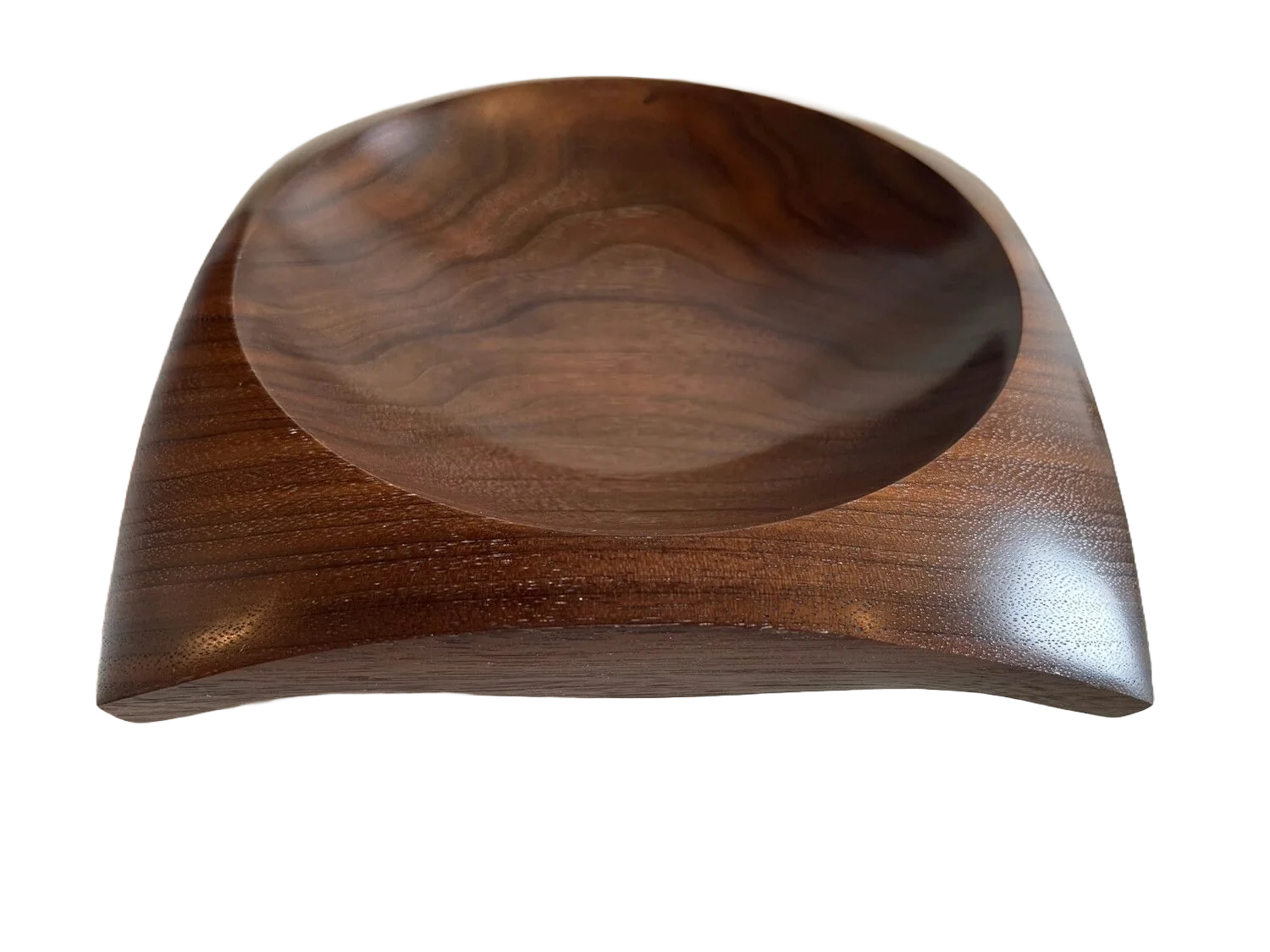 a square bowl with a circle middle and downward facing corners